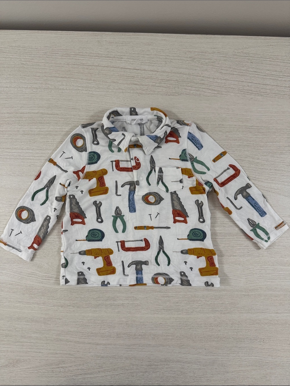 Angel Dear Long-Sleeve Polo with Multicolor Tool Print EUC Size 3-6M